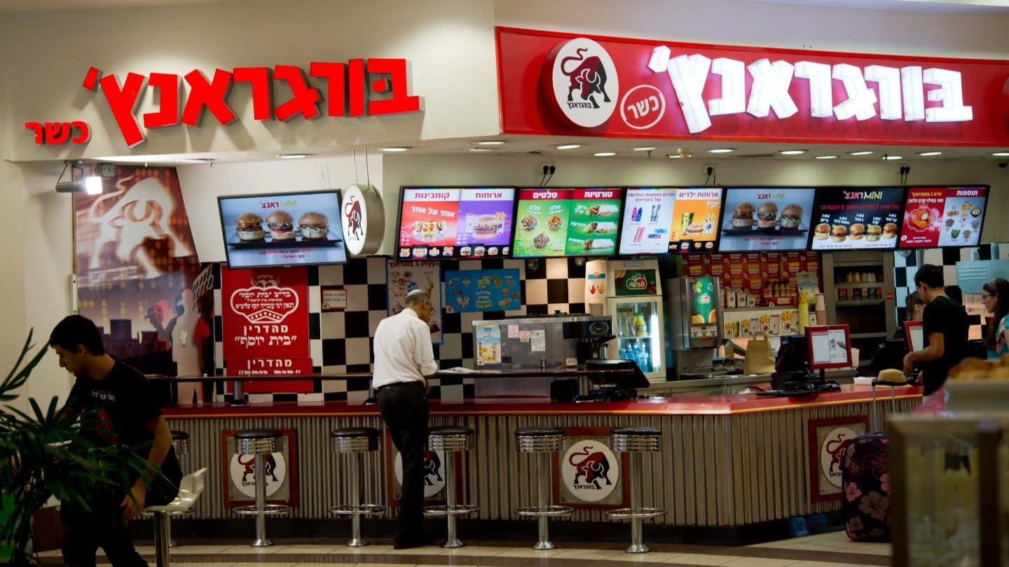 Robots take over South Korea's No Brand Burger, collecting orders, cooking  and serving customers